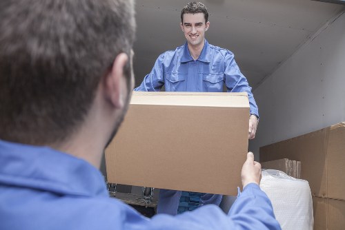 Professional moving team handling boxes in Crystal Palace