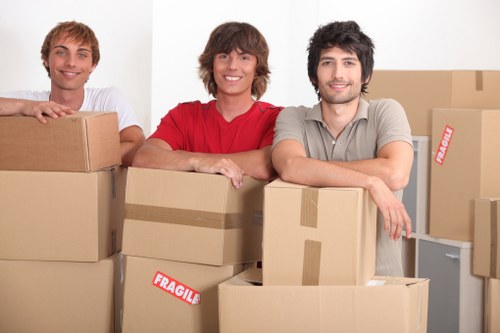 Experienced moving crew handling cargo