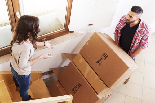 Professional movers handling customer belongings